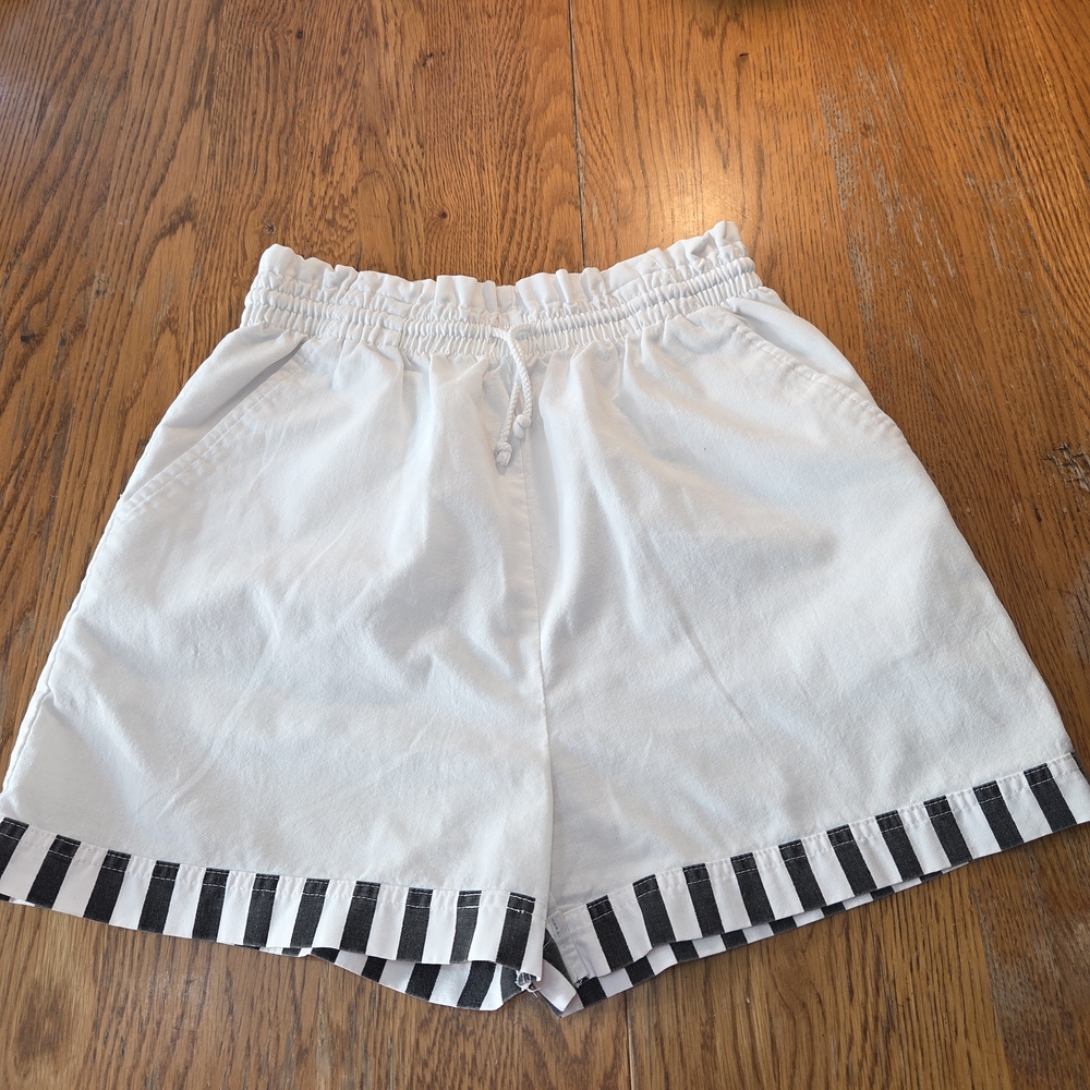Cobble Beach White Shorts with Black Striped Hem. CCCP